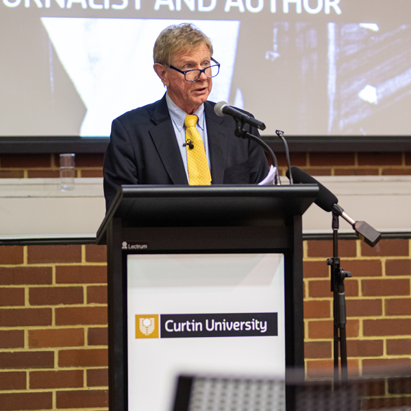 Kerry O'Brien speaking at the podium at his JCPML anniversary lecture